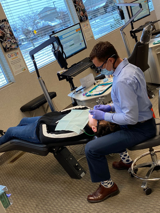 Dr. Brent Treating Patient